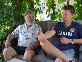 Veteran LaSalle councillor Ray Renaud, left, and his son Jeff Renaud relax Monday in his backyard. Renaud announced he is retiring from politics but he is endorsing his son who is running for councillor in the upcoming municipal election. JULIE KOTSIS/The Windsor Star