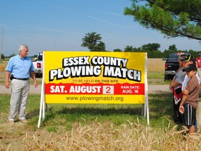 Chatham-Kent-Essex MPP Rick Nicholls along with Essex County Queen of the Furrow Emma Anger and two 4H Plowing competitors admire the new sign unveiled Saturday. (Courtesy of Essex County Plowmen’s Association)