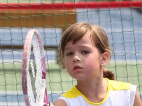 AMA Tennis Club's Stasia Kryk returns a shot enroute to winning the United States Tennis Association Under 8 Tournament in Birmingham. (The Windsor Star)