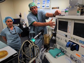 Dr. Bill Taylor and RN Lori Ford, left, with anestesia equipment in the operating room at Windsor Regional Hospital Ouellette Avenue campus July 24, 2014. Last June 18th, 110 surgeries were re-scheduled due to a sensor failure in the hospital's medical air system. (NICK BRANCACCIO/The Windsor Star)