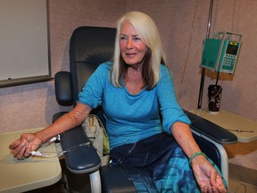Eileen Anderson, 67, receives treatment for Alpha-1 antitrypsin deficiency at a Walker Road clinic on Tuesday July 29, 2014. (NICK BRANCACCIO/The Windsor Star)
