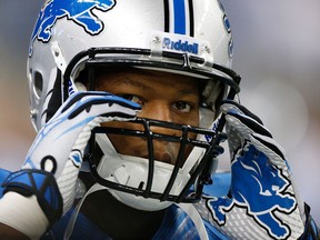 Detroit's Ndamukong Suh adjusts his helmet before playing the Minnesota Vikings at Ford Field. (Photo by Gregory Shamus/Getty Images)