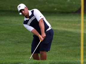 Bryce Evon chips to the 16th green at Pointe West during Jamieson Junior Golf Tour stop Monday June 30, 2014. Evon bogeyed the hole, but otherwise was as hot as the weather. (NICK BRANCACCIO/The Windsor Star)