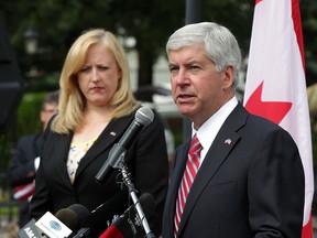 Transport Minister Lisa Raitt, left, and Michigan Governor Rick Snyder announce appointments to International Authority and Windsor-Detroit Bridge Authority during a press conference at Canadian Club Heritage Centre, part of Hiram Walker's July 30, 2014 -- (NICK BRANCACCIO/The Windsor Star)