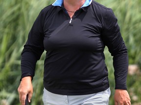 Defending champion Mary Ann Hayward smiles after making an eagle on the third hole during the Ontario Senior Women's Golf Championship at Ambassador. (DAN JANISSE/The Windsor Star)
