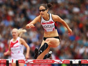 Windsor's Noelle Montcalm competes in the women's 400 metres hurdles at Hampden Park during  the Glasgow 2014 Commonwealth Games in Glasgow. (Photo by Cameron Spencer/Getty Images)