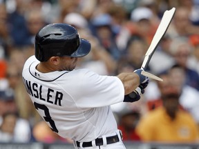 Ian Kinsler #3 of the Detroit Tigers breaks his bat hitting a RBI-single during the sixth inning to drive in Rajai Davis against the Oakland Athletics at Comerica Park on July 2, 2014 in Detroit, Michigan. (Duane Burleson/Getty Images)