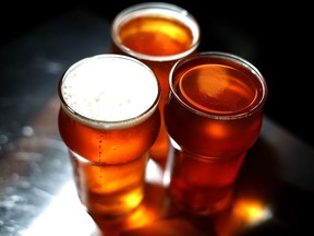 Freshly poured glasses of Russian River Brewing Company Pliny the Younger triple IPA beer sit on a counter at Russian River Brewing Company on February 7, 2014 in Santa Rosa, California. Photo by Justin Sullivan/Getty Images)