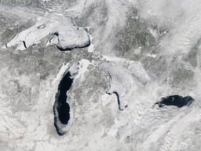 The Great Lakes are seen with ice covering 80.3 percent of the lakes February 19, 2014 from space. According to National Oceanic and Atmospheric Administration (NOAA), the ice coverage peaked at 88.4 percent on February 12-13, an amount not recorded since 1994. (NASA via Getty Images)
