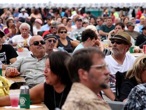 A sea of blues fans watch Nigel Mack and the Blues Attack perform at the 2014 Bluesfest Windsor event, Saturday, July 12, 2014, at the Riverfront Festival Plaza. Bluesfest is celebrating it's 20th anniversary. (RICK DAWES/The Windsor Star)
