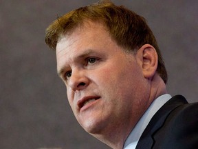 Foreign Affairs Minister John Baird responds to a question at a news conference Friday, May 2, 2014 in Ottawa. THE CANADIAN PRESS/Adrian Wyld