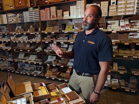 Jay Henderson, manager of the La Casa Del Habano cigar shop in downtown Windsor, Ont. would like to have a patio in front of the Ouellette Ave. store but the city is not allowing it. (DAN JANISSE/The Windsor Star)