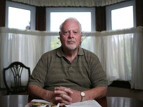 Tom Noble, pictured in his home Friday, July 4, 2014, is one of more than 2000 people who have signed a petition asking the provincial government to develop an Ontario Dementia Plan.  Noble is a caregiver for his wife Janet, who has dementia.  (DAX MELMER/The Windsor Star)