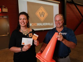Lindsay Gammon and Chris Ryan lead a group of  Wyandotte Street east business owners in the launch of #digwalkerville, a social media campaign on July 8, 2014 during a press conference at Walkerville Brewery. (JASON KRYK/The Windsor Star)