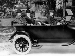 Horace Dodge, left rear, and John Dodge, right rear, take delivery of the first Dodge car on Nov. 14, 1914. (Photo courtesy of Chrysler)
