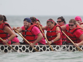 People take part in the International Dragon Boat Festival for the Cure at Tecumseh Waterfront Park, Sunday, July 13 , 2014.  (DAX MELMER/The Windsor Star)