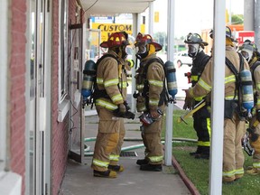 Windsor fire crews respond to a fire at an apartment in the 3100 block of Walker Road on Saturday, July 5, 2014. (DAX MELMER/The Windsor Star)