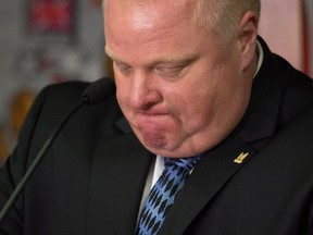 Toronto Mayor Rob Ford holds back his emotions while speaking during an invite-only press conference at City Hall in Toronto on Monday, June 30, 2014. THE CANADIAN PRESS/Darren Calabrese