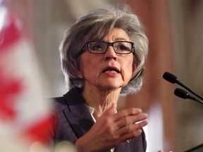 In this file photo, Beverly McLachlin, Chief Justice of the Supreme Court of Canada, delivers a speech in Ottawa, Tuesday, February 5, 2013. McLachlin insisted Friday there was nothing wrong with how she and her office consulted with the federal government regarding a presumptive nominee to the high court's ranks. THE CANADIAN PRESS/Fred Chartrand