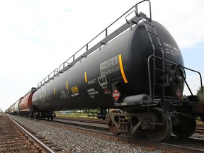 A rail tanker that carries flammable liquid petroleum gas is shown Monday, July 14, 2014, on the CP rail line near the North Service Rd. and Central Ave. in Windsor, Ont. (DAN JANISSE/The Windsor Star)
