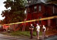 Windsor police and fire crews control the scene of a fire at 480 Vera Pl., near downtown, Sunday, July 27, 2014. Two families from the side by side dwelling have been taken in by Red Cross. (RICK DAWES/The Windsor Star)