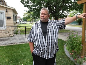 WINDSOR, ONTARIO- JULY 30, 2014 - Patrick Roberts lives directly across the street from the Klinec Manufacturing Ltd. factory on St. Luke Rd. in Windsor, ON. He is shown Wednesday, July 30, 2014, voicing his concerns about the business. (DAN JANISSE/The Windsor Star) (For story by Carolyn Thompson)
