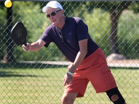 The town of LaSalle officially opened a new pickle ball court on Thursday, July 17, 2014, at the Vince Marcotte Park. A ribbon cutting ceremony was held. Blake Gifford plays a match after the opening.  (DAN JANISSE/The Windsor Star)