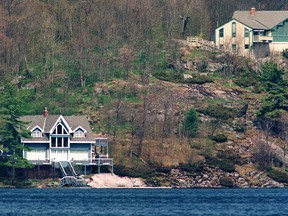 In this file photo, two cottages share a rocky cliff along Lake Joseph in Cottage Country. Photo by Chris Bolin/National Post