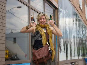 Marne Noestheden, program coordinator for Susan's Art for All, standing beside the soon to be recycle mART storefront at 998 Drouillard Rd. in Windsor, Ont. on Thursday, July 31, 2014. (JASON RANKIN/THE WINDSOR STAR)