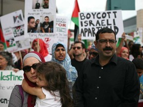 People participate in a solidarity march for Palestine in downtown Windsor, Friday, July 18, 2014.  (DAX MELMER/The Windsor Star)