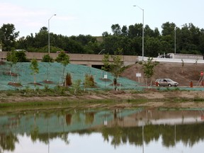 A storm water pond and new vegetation is pictured at the Rt. Hon. Herb Gray Parkway project's Matchette Road construction access point, Thursday, July 10, 2014. (RICK DAWES/The Windsor Star)