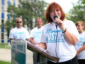 Caroline Postma, a Ward 2 city councillor from  2003-2010, announces her candidacy for Ward 3 outside City Hall, Friday, July 18, 2014.  (DAX MELMER/The Windsor Star)