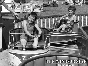 Jeff Lafreniere, 8, left, and his brother Steve, 10, ride the Whip at Stoney Point's summer carnival on June 13, 1983. (H. Sullivan/Windsor Star)