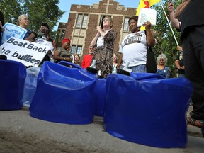 In this file photo, Maude Barlow and Lila Cabbil (right) speak during a water rally in Detroit on Thursday, July 24, 2014. A group of Canadians delivered containers of water to a water station in Detroit as a show of support for those who have had their water shut off.            (Tyler Brownbridge/The Windsor Star)