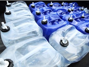 Water jugs bound for Detroit are seen in the back of a truck in Windsor on Thursday, July 24, 2014.            (Tyler Brownbridge/The Windsor Star)