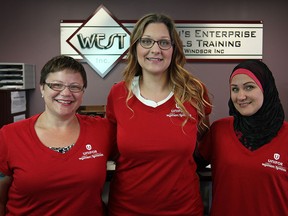 From left, Jennifer Dubreuil, Sarah Strnisa, and Svetlana Zyryanova, pictured at Woman Enterprise Skills Training (WEST), Saturday, July 26, 2014, are participating in the Skilled Trades Awareness Workshop starting Monday, July 28, 2014.   (DAX MELMER/The Windsor Star)