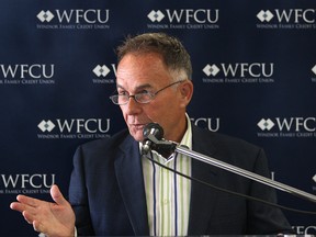 The Windsor Family Credit Union held a ribbon cutting ceremony Tuesday, July 15, 2014, to officially open their newest branch in downtown Windsor, Ont. located at Ouellette at University. WFCU CEO and president Marty Komsa speaks during the event. (DAN JANISSE/The Windsor Star)