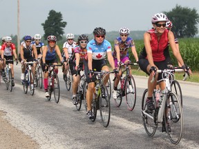 Local cyclists bike their way through Essex County joining thousands of others worldwide as they participate in Women's 100, Sunday, July 20, 2014.  (DAX MELMER/The Windsor Star)