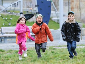 A trio of friends plays in a Vancouver park in a file photo.
( Jason Payne/PNG files)