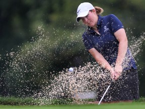 Emily Stadder hits a bunker shot during the Jamieson Junior Golf Tour Monday at Beach Grove.  (DAN JANISSE/The Windsor Star)