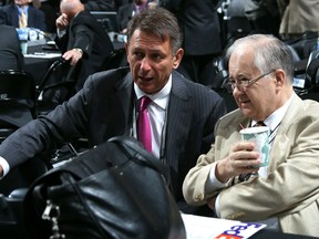 Detroit Red Wings GM Ken Holland, left, here with senior vice-president Jim Devellano, feels the team could make a trade at the NHL draft is there is one worth making.