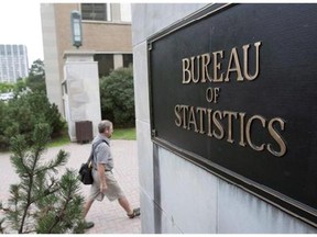 An employee make his way to work at Statistics Canada in Ottawa on July 21, 2010. THE CANADIAN PRESS/Sean Kilpatrick