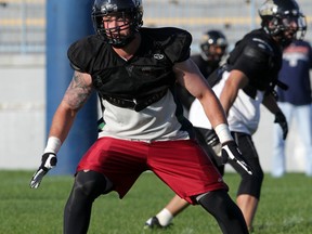 AKO middle linebacker Chris Deneau has impressed coaches during practice at Windsor Stadium Wednesday August 20, 2014. (NICK BRANCACCIO/The Windsor Star)