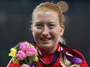 Bronze medallist Virginia Mclachlan of Windsor poses on the podium during the medal ceremony in the Women's 200m - T35 Final on day 2 of the London 2012 Paralympic Games at Olympic Stadium. (Photo by Michael Steele/Getty Images)