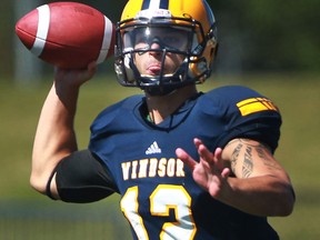 Windsor quarterback, Austin Kennedy runs the offence during OUA football action at Alumni Field between the Windsor Lancers and the Carleton Raven. (DAX MELMER/The Windsor Star)
