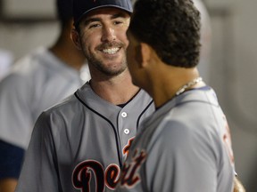 Detroit's Justin Verlander, left, talks with teammate Miguel Cabrera in the dugout after the seventh inning against the Chicago White Sox at U.S. Cellular Field in Chicago. (Photo by Brian Kersey/Getty Images)