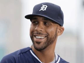 Detroit Tigers starting pitcher David Price is interviewed before an interleague baseball game against the Colorado Rockies, Saturday. (AP Photo/Carlos Osorio)