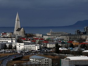 Buildings surround the Hallgrimskirkja tower in the Icelandic capital on April 7, 2014 in Reykjavik, Iceland. Since the financial meltdown of 2008 which saw the Icelandic economy come close to collapse the island has been slowly recovering and unemployment levels are beginning to return to normal.  (Photo by Matt Cardy/Getty Images)