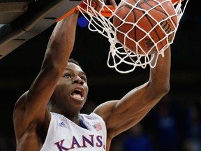 Kansas guard Andrew Wiggins dunks against Oklahoma State in the quarter-finals of the Big 12 Conference men's tournament in Kansas City. (AP Photo/Orlin Wagner, File)