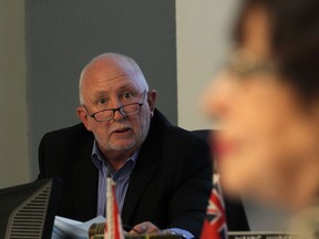 Mike Phipps, chief administrative officer for the Town of Amherstburg, gives councillor Diane Pouget an expressive look during discussions in this August 2014 file photo. (DAX MELMER/The Windsor Star)